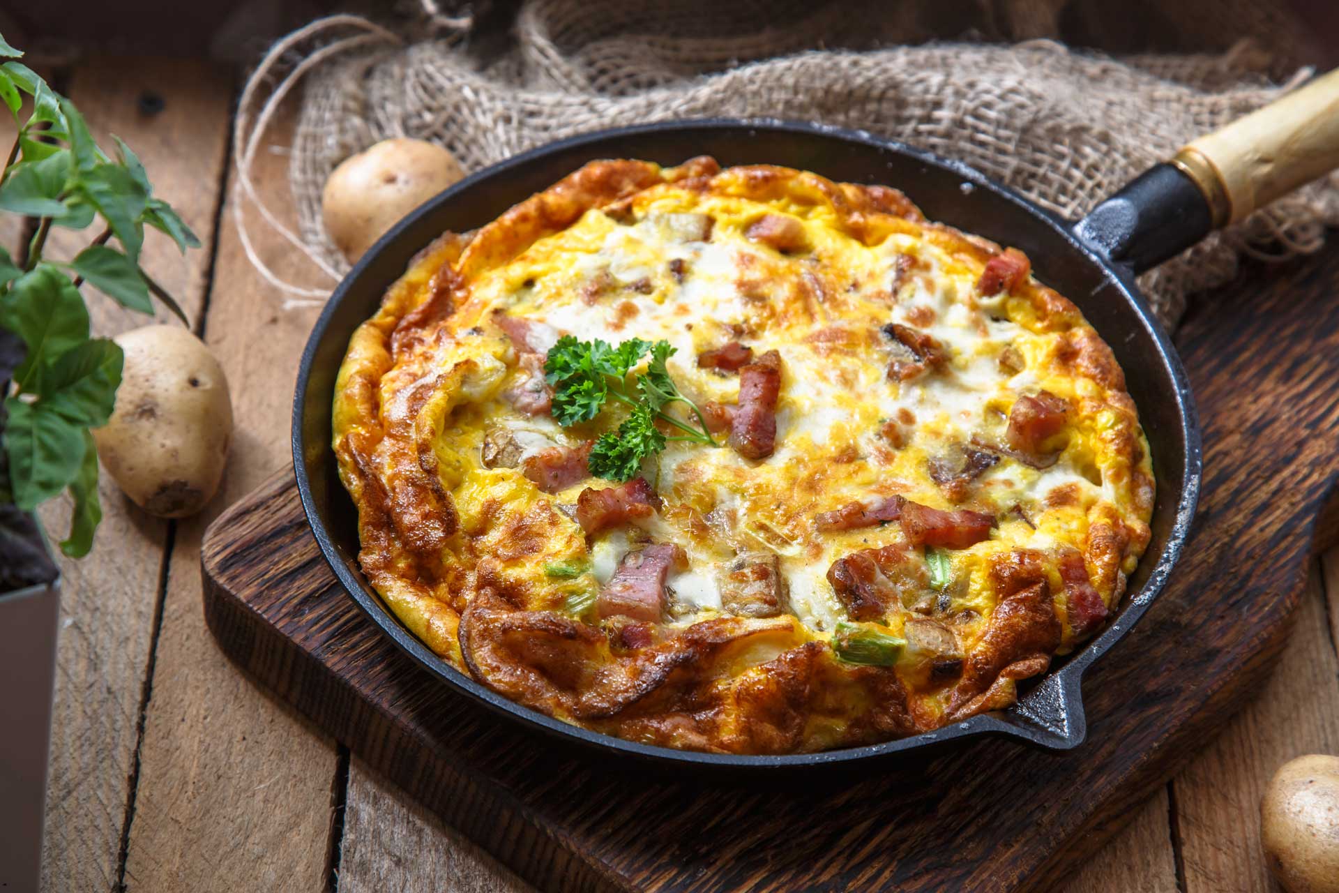 french-omelette-savoyarde-with-bacon-cheese-and-le-PAEMZXB.jpg